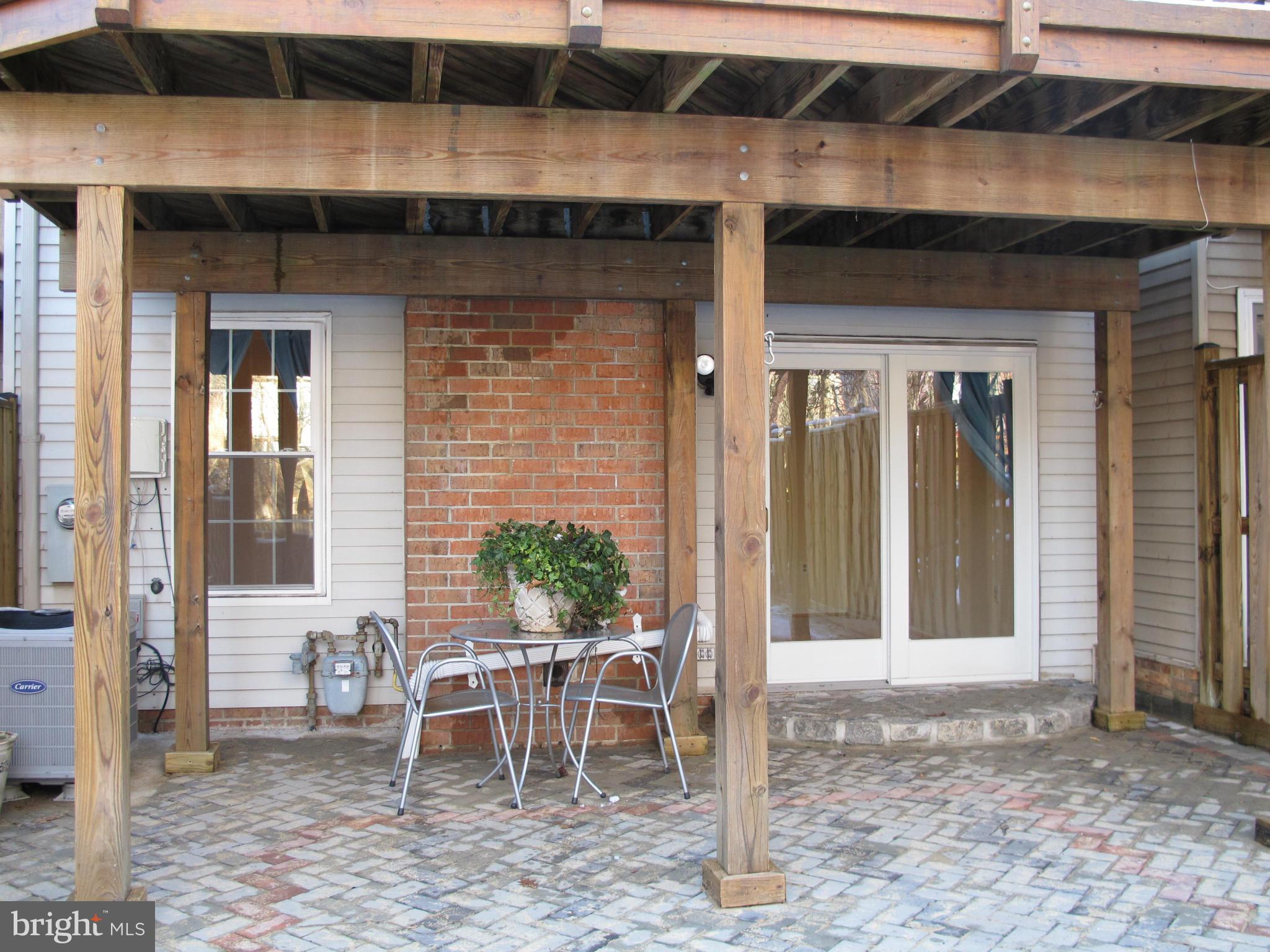 7726 Asterella Court Springfield, VA 22152 - Photo 21 of 22 a dining room with a table and chairs