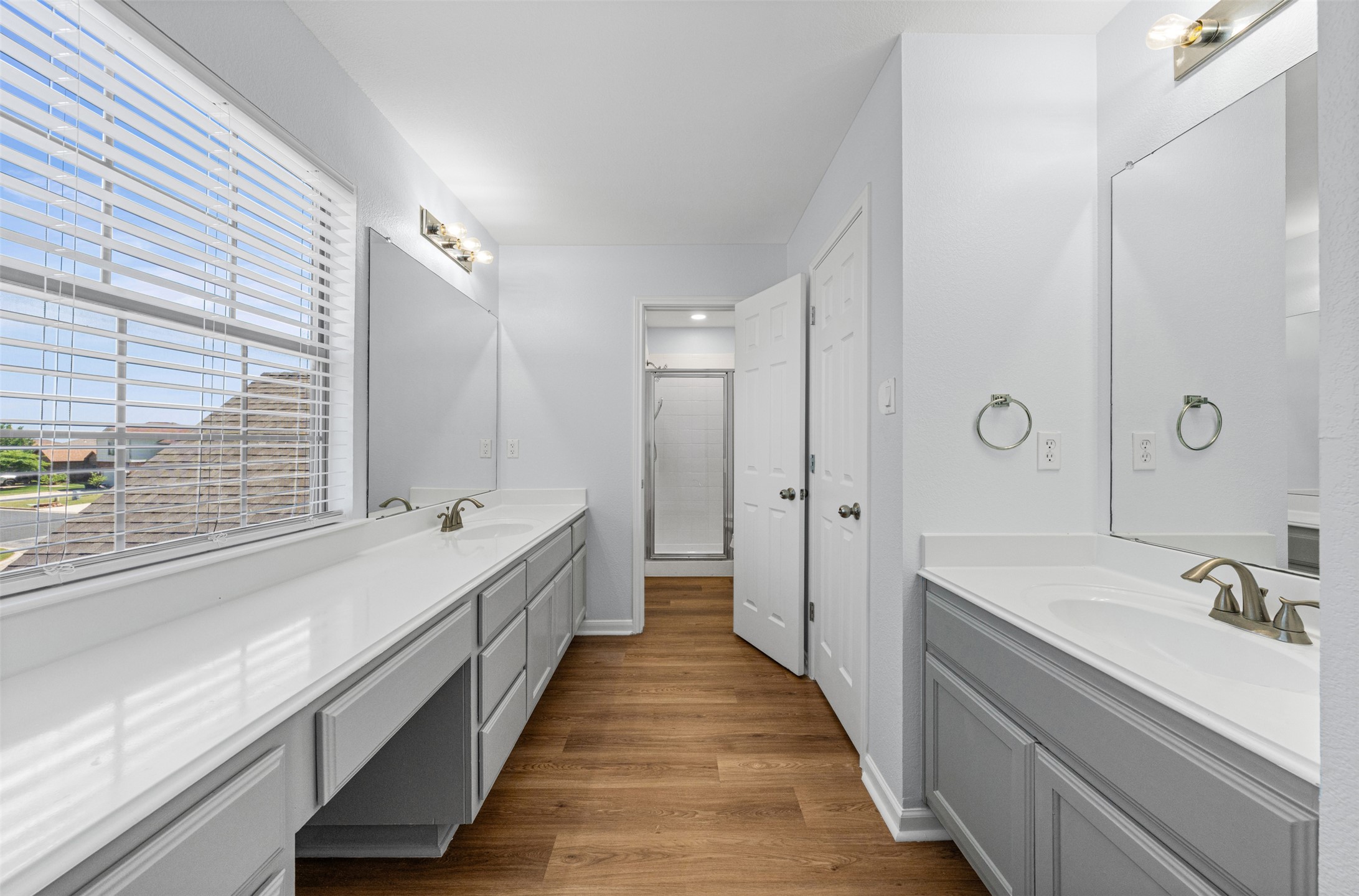 243 Engineers Pass Jarrell, TX 76537 - Photo 24 of 40 Bathroom featuring dual vanities with light gray cabinetry and white countertops