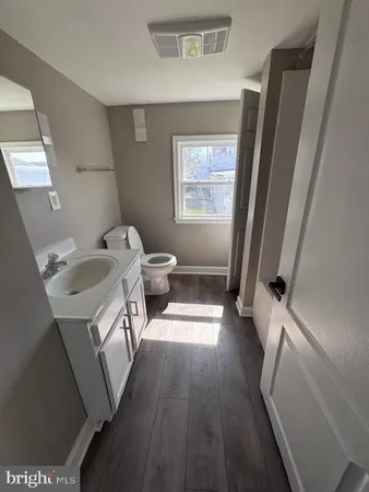 a bathroom with a sink and a toilet