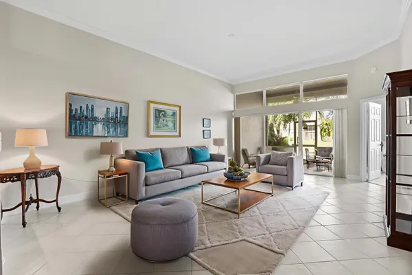 a view of an empty room with glass door