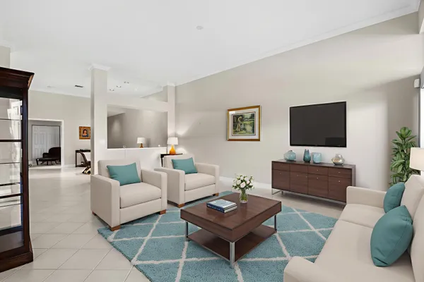 a view of livingroom with furniture and a chandelier