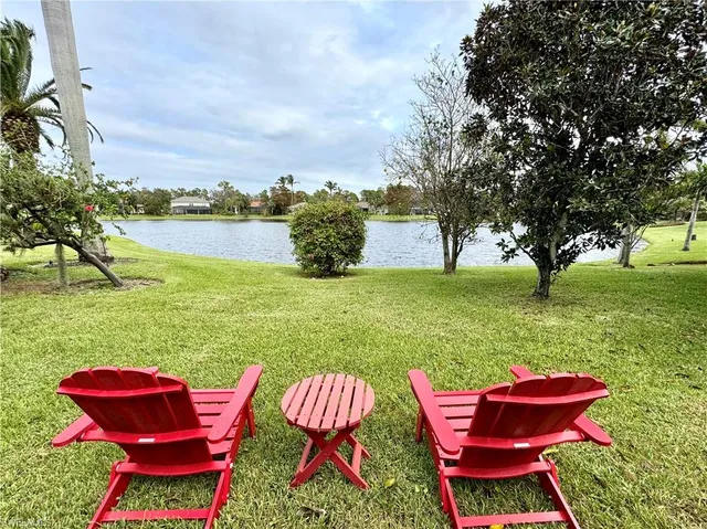 a view of a chairs in a yard