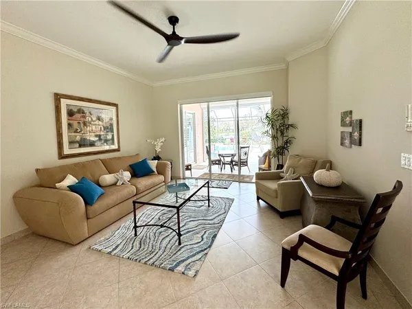 a dining room with a table and chairs