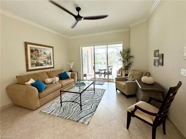 a dining room with a table and chairs