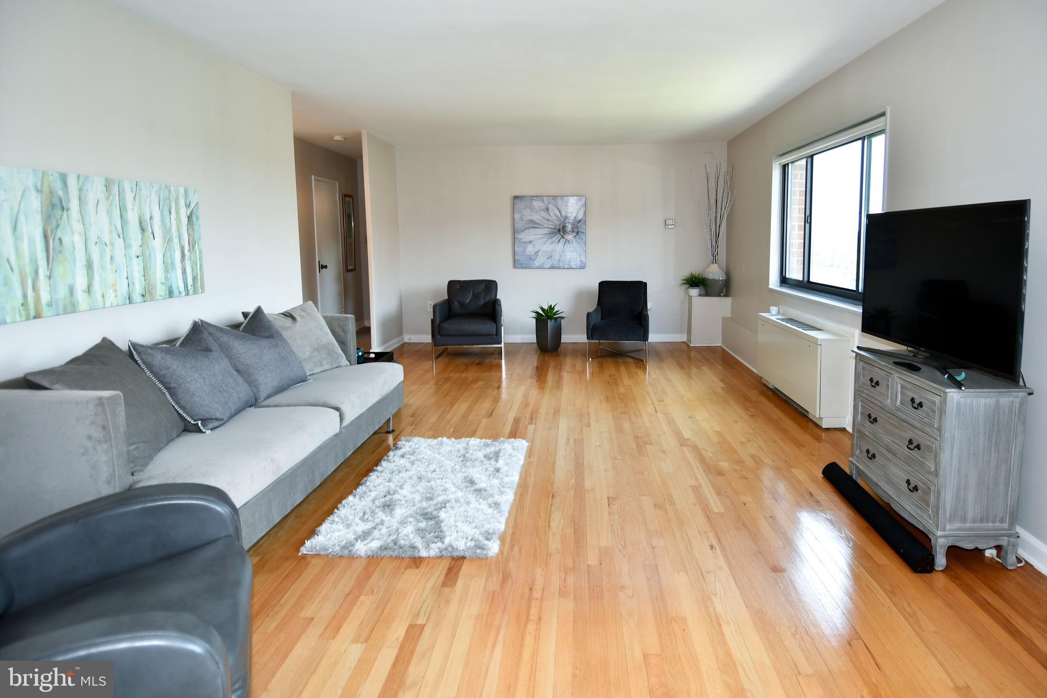 1200 South Arlington Ridge Road, Unit 704 Arlington, VA 22202 - Photo 5 of 30 Living Room with large windows