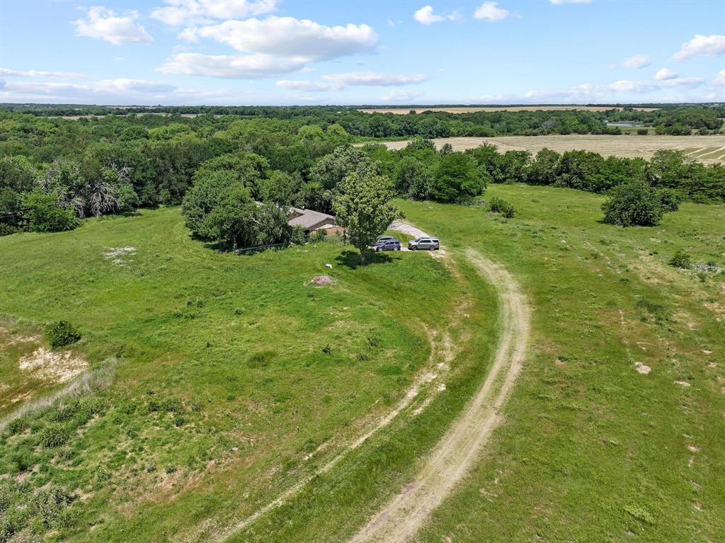747 Vineyard Road Gunter, TX 75058 - Photo 21 of 32 a view of a lush green space