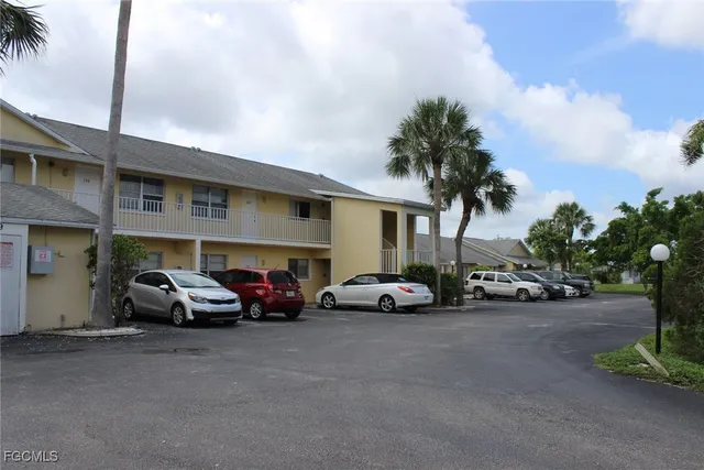 a view of a car parked in front of a building