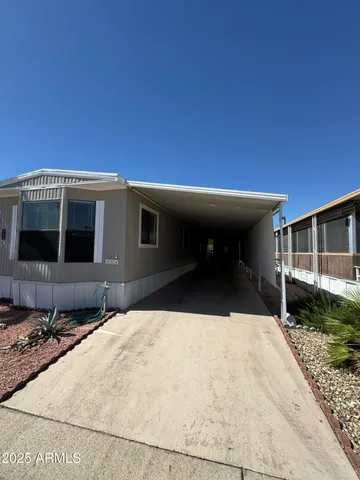 a view of a house with palm tree