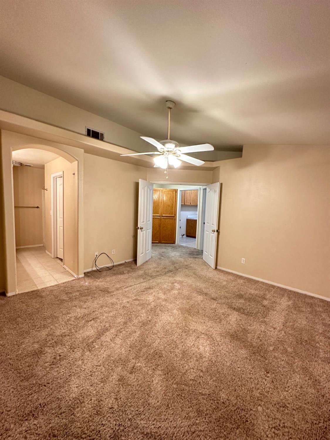 596 Grenache Avenue Madera, CA 93637 - Photo 15 of 26 a view of a kitchen with a sink