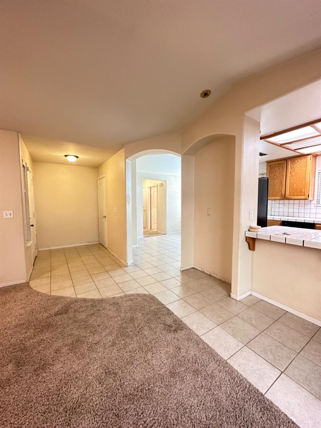 596 Grenache Avenue Madera, CA 93637 - Photo 4 of 26 a view of a room with a flat screen tv