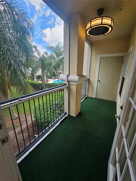 5174 Northridge Road, Unit 209 Sarasota, FL 34238 - Photo 16 of 25 a view of a balcony with a swing
