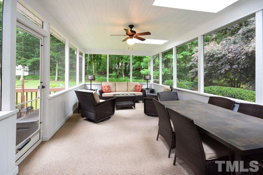 6013 Hampton Ridge Road Raleigh, NC 27603 - Photo 20 of 25 a living room with furniture and a large window
