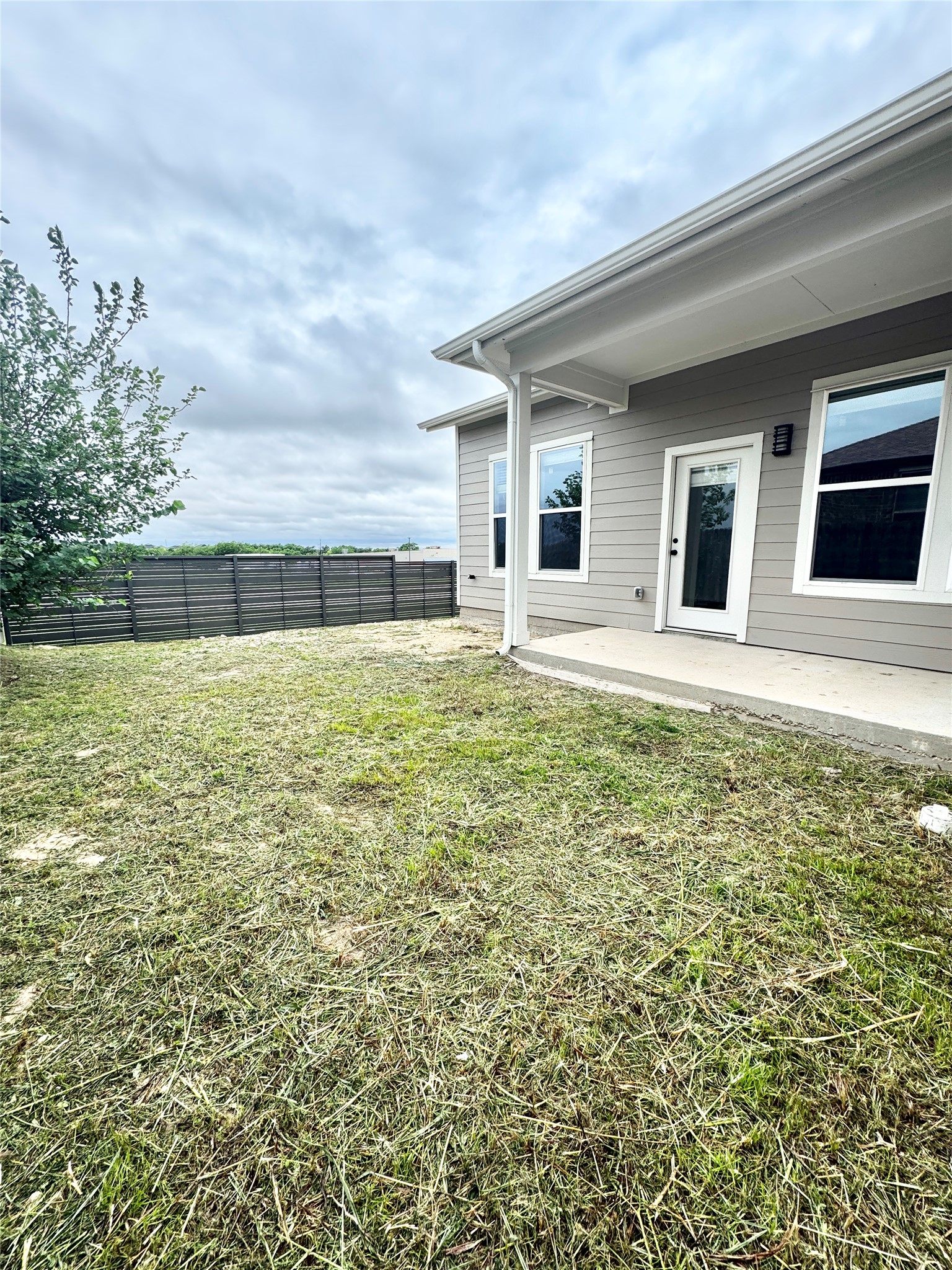 100 Zayd Court, Unit A Jarrell, TX 76537 - Photo 20 of 20 front view of a house with a yard