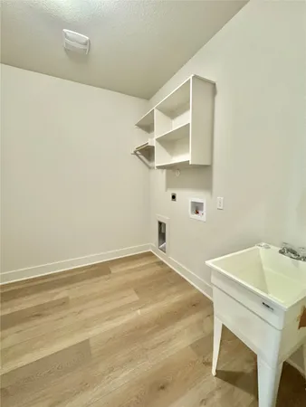 a view of a room with racks on the wall