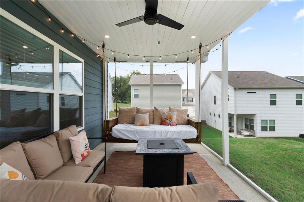 110 Waterside Ridgg Calhoun, GA 30701 - Photo 28 of 31 a outdoor living space with furniture and a fireplace