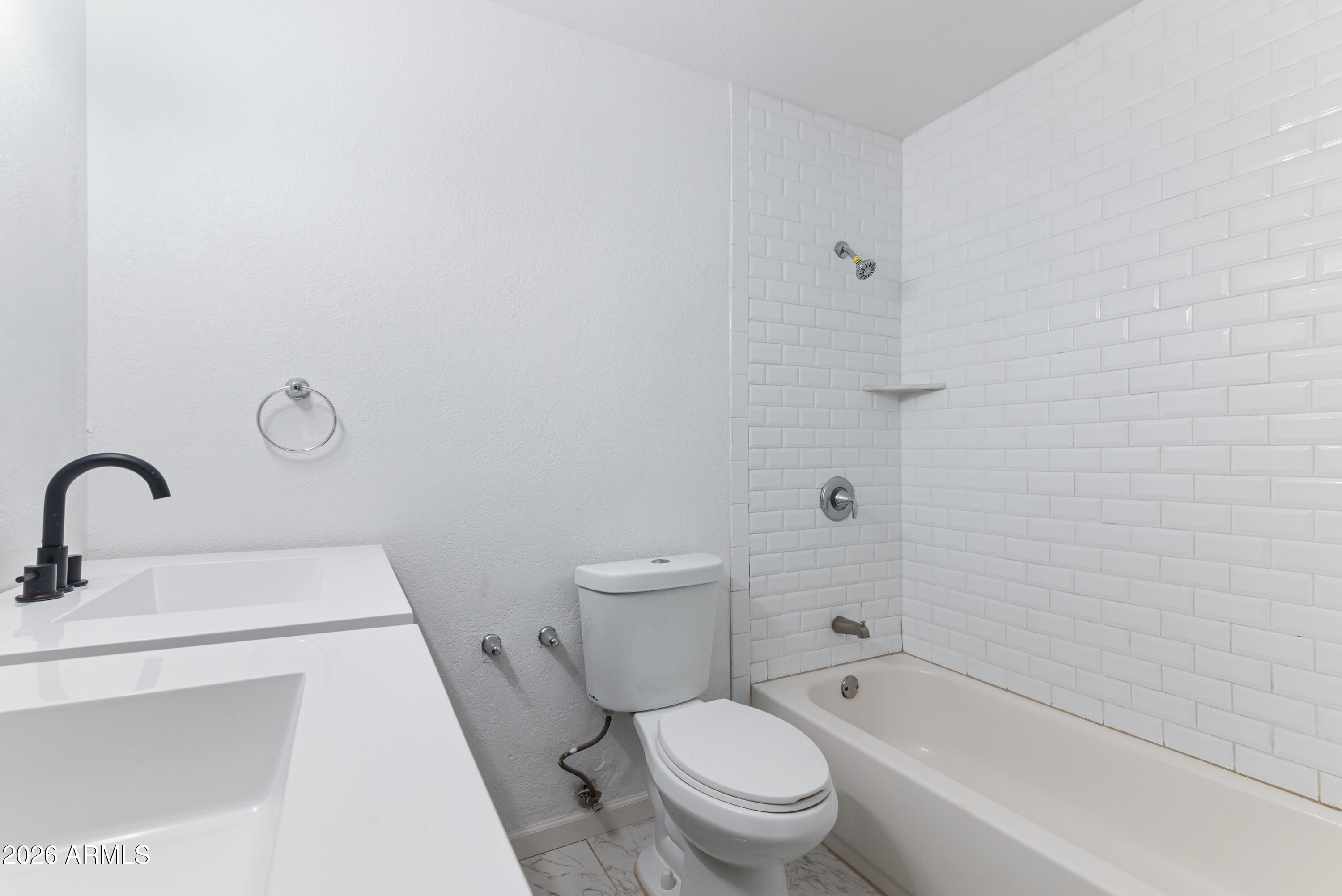 860 West McLellan Road Mesa, AZ 85201 - Photo 21 of 26 a bathroom with a bathtub shower sink mirror vanity and toilet