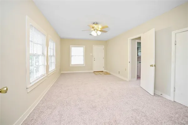 an empty room with windows