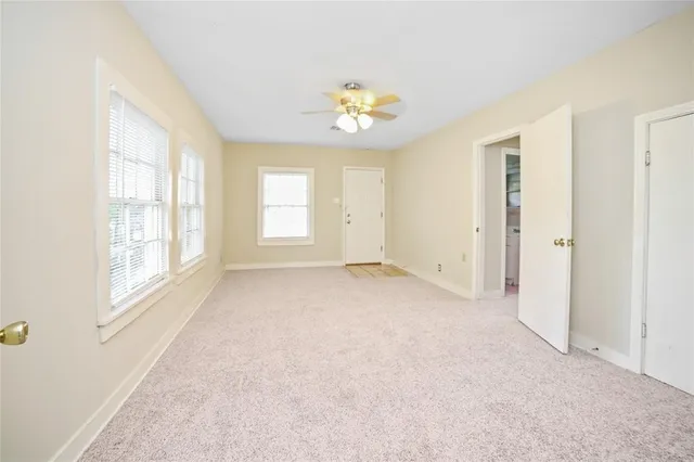 an empty room with windows