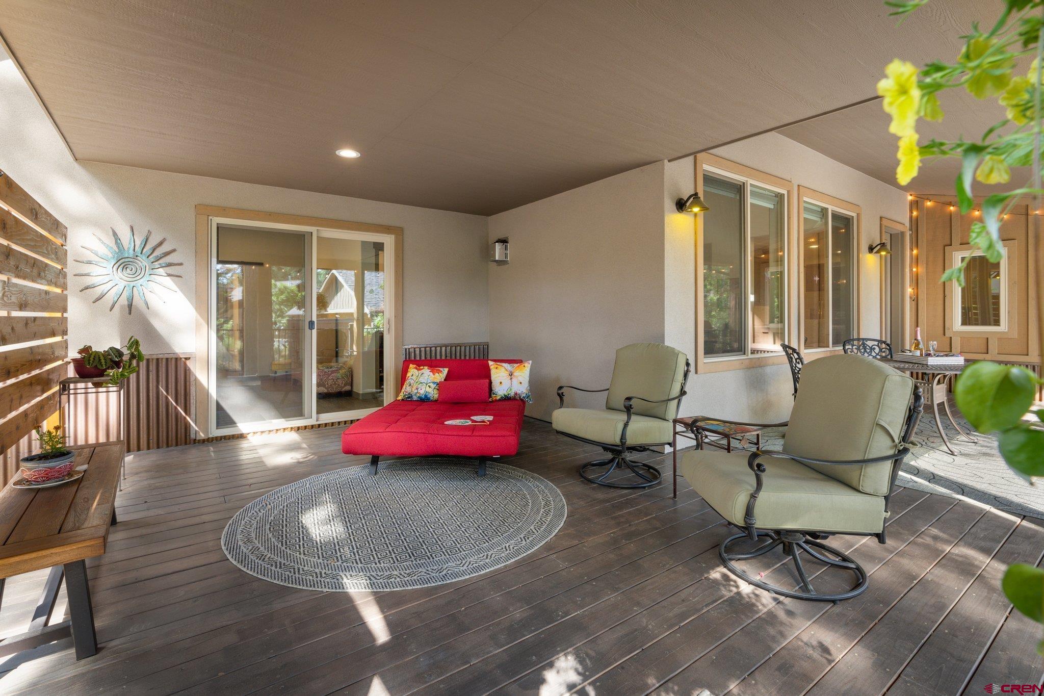 65 Needle Creek Trail Durango, CO 81301 - Photo 15 of 35 a living room with furniture and a chandelier