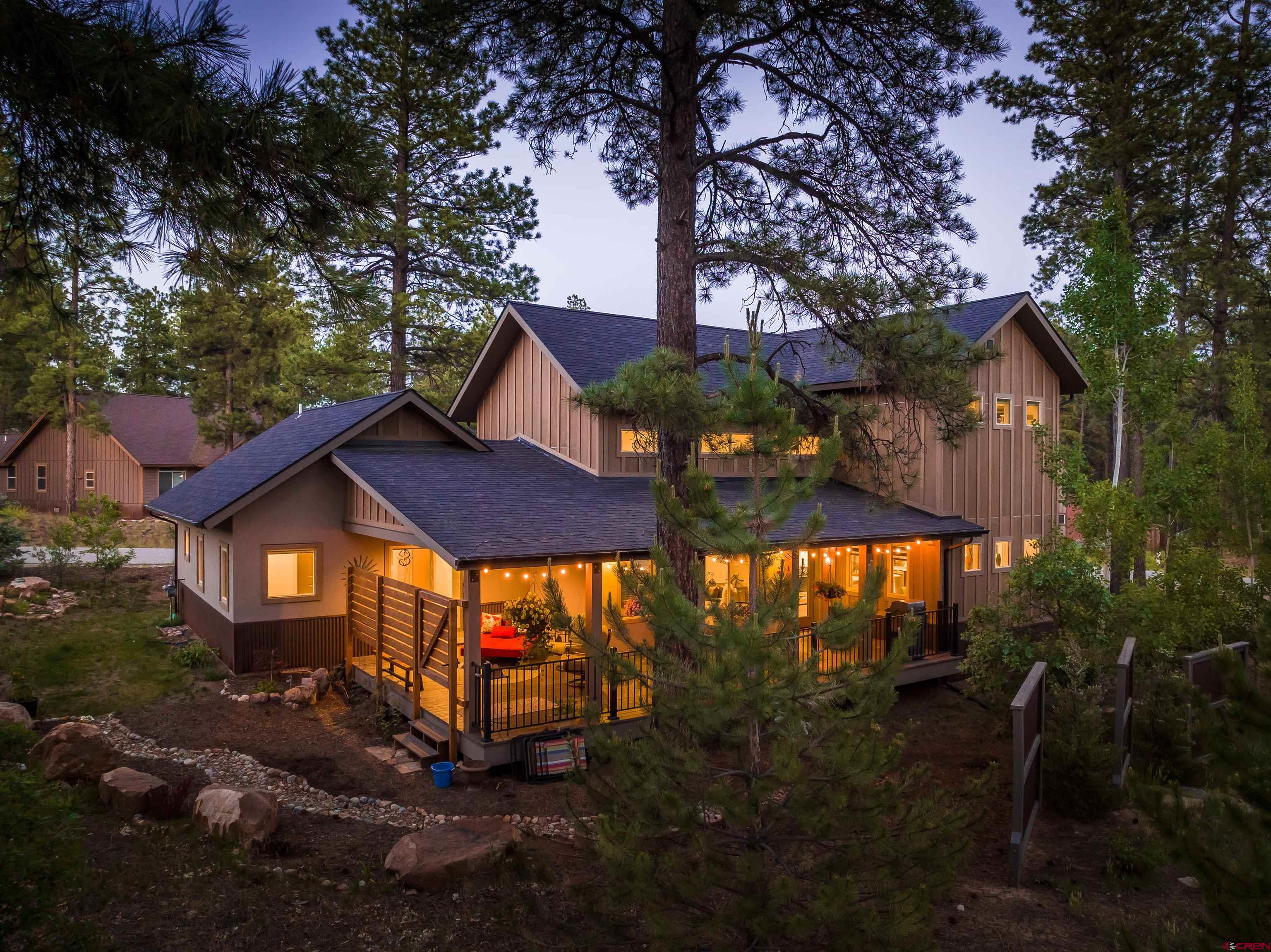 65 Needle Creek Trail Durango, CO 81301 - Photo 22 of 35 a view of a house with yard and sitting area