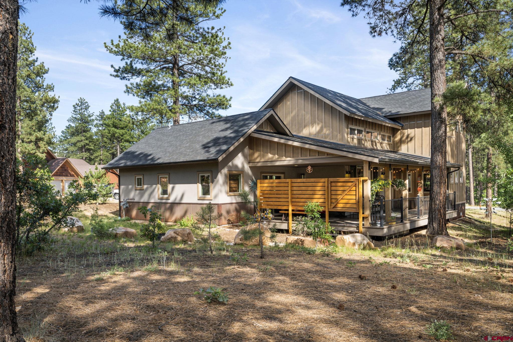 65 Needle Creek Trail Durango, CO 81301 - Photo 24 of 35 a view of a house with wooden fence
