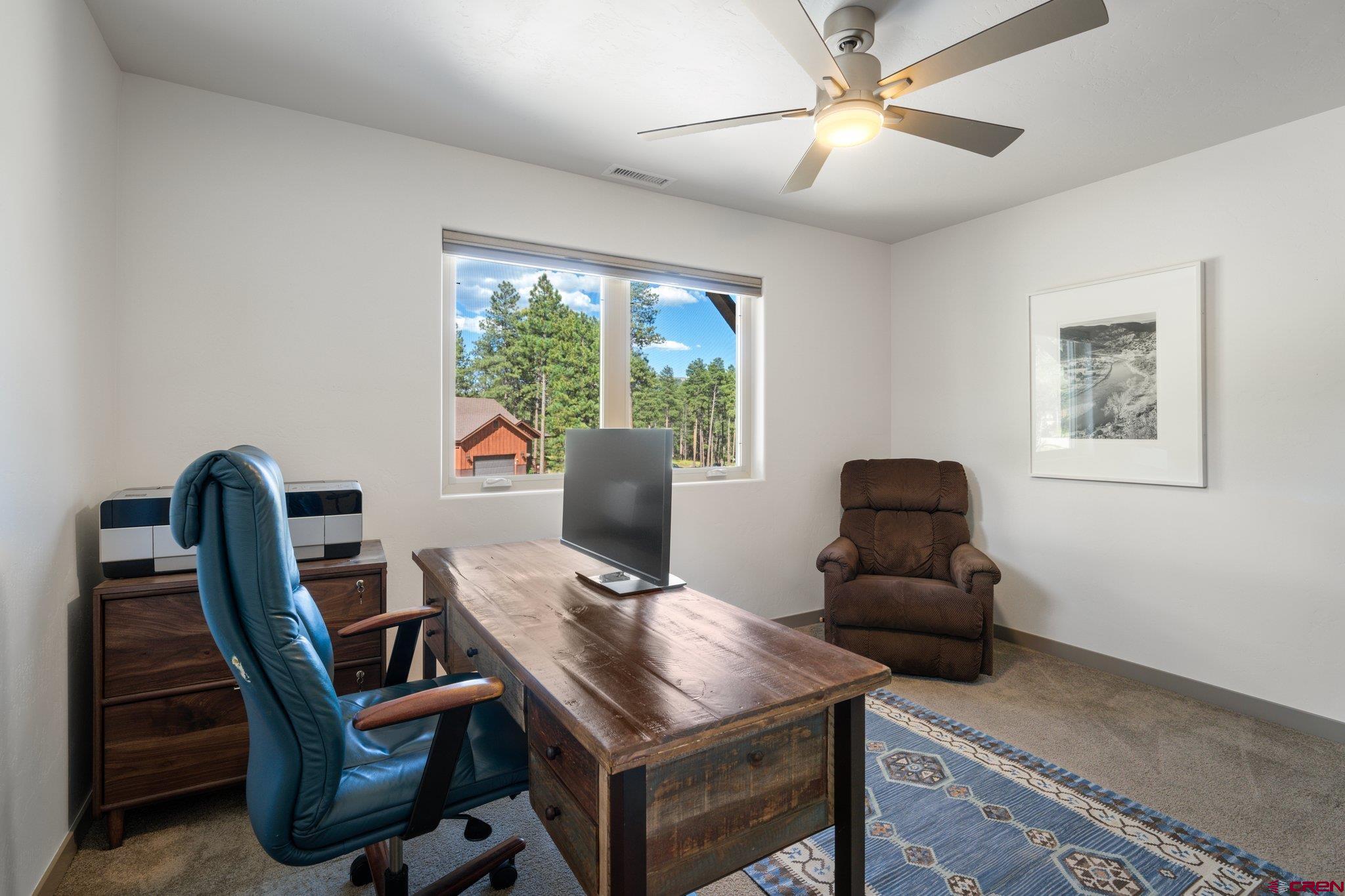 65 Needle Creek Trail Durango, CO 81301 - Photo 27 of 35 a view of a workspace with furniture and a window