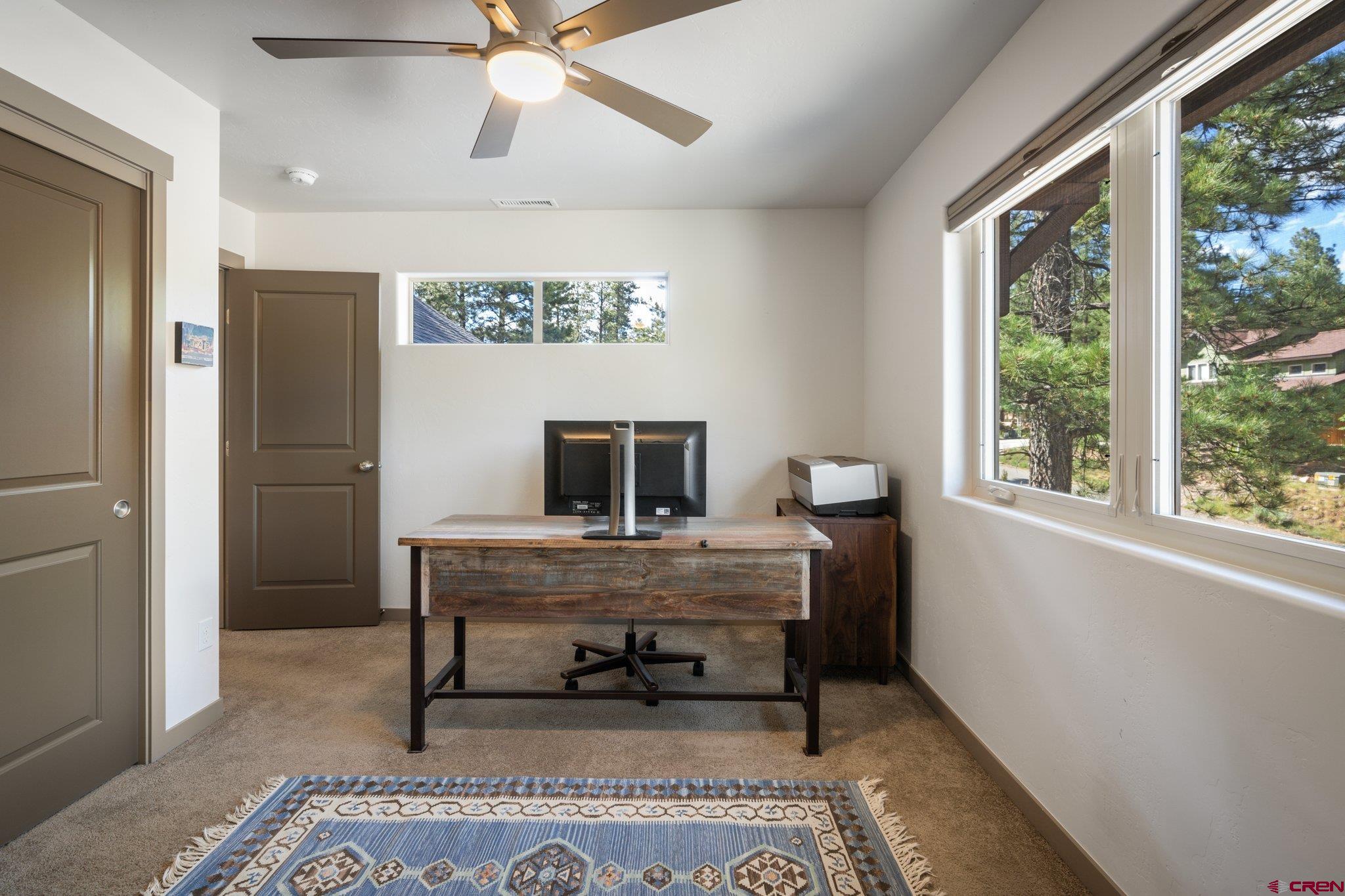 65 Needle Creek Trail Durango, CO 81301 - Photo 28 of 35 a view of a workspace with furniture and a window