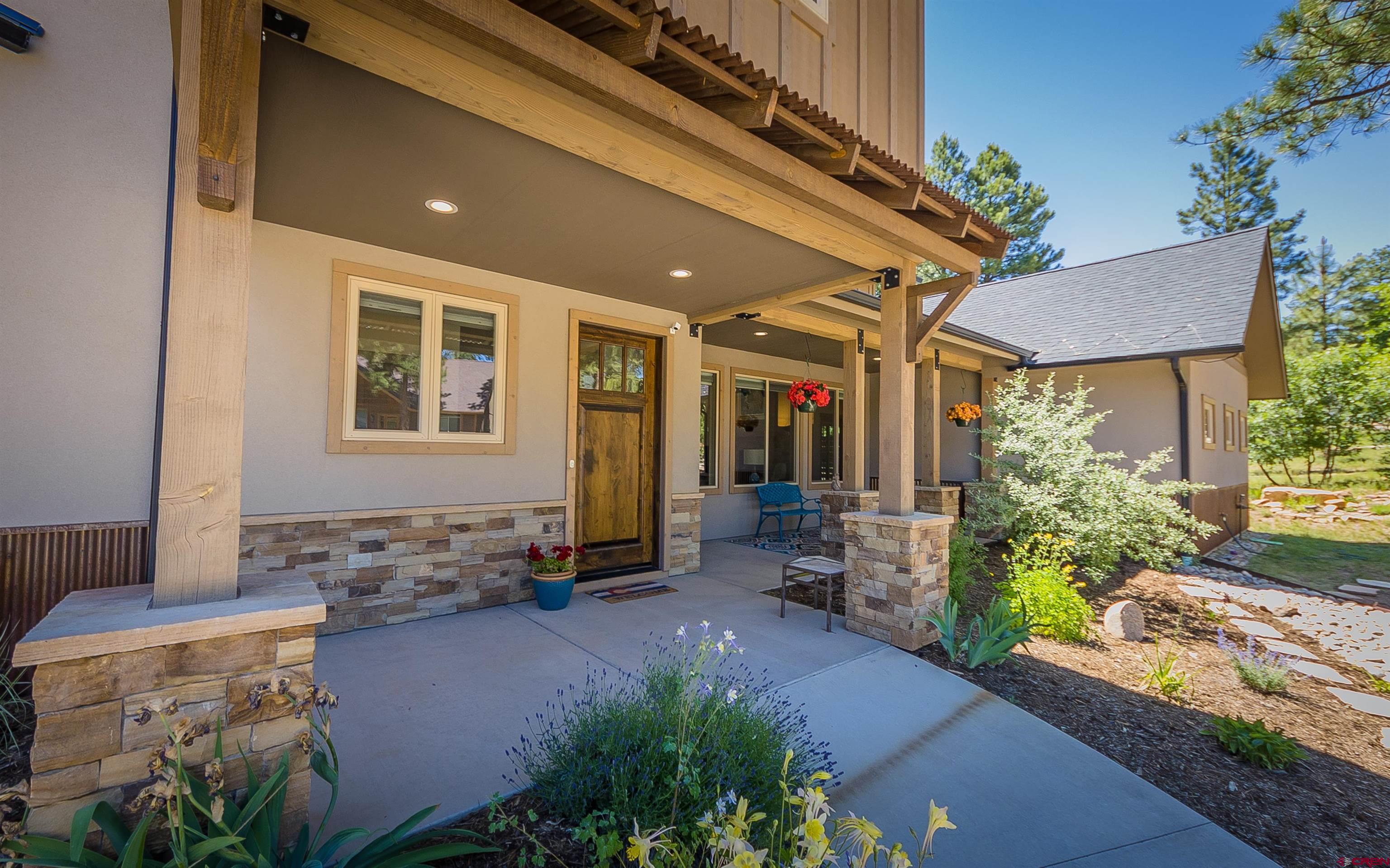 65 Needle Creek Trail Durango, CO 81301 - Photo 3 of 35 a front view of house with yard