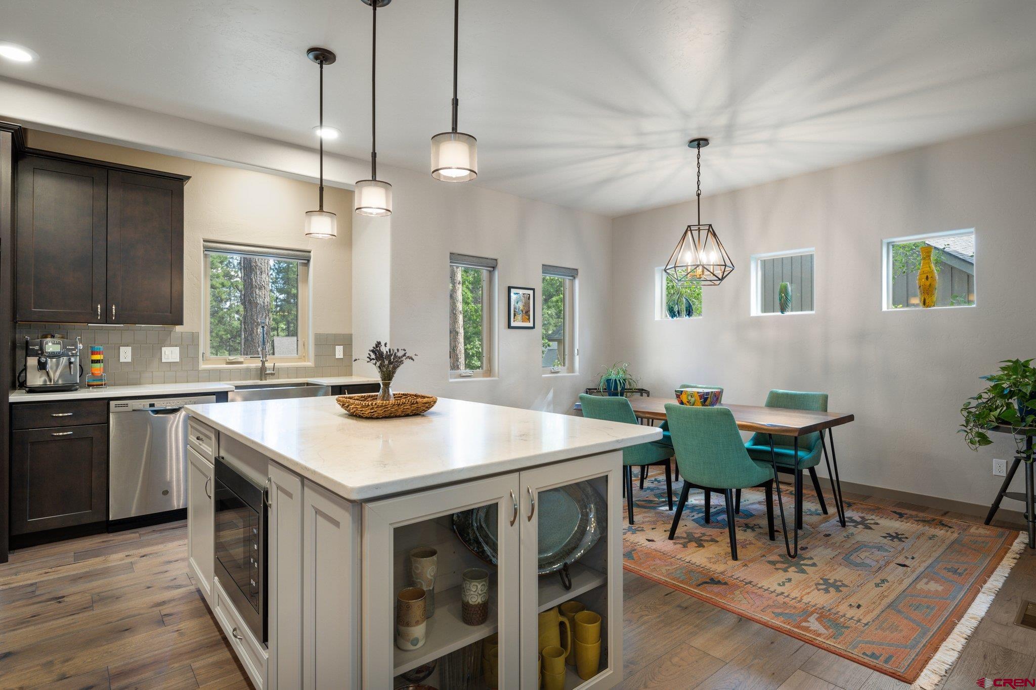 65 Needle Creek Trail Durango, CO 81301 - Photo 8 of 35 a kitchen with a table and chairs in it