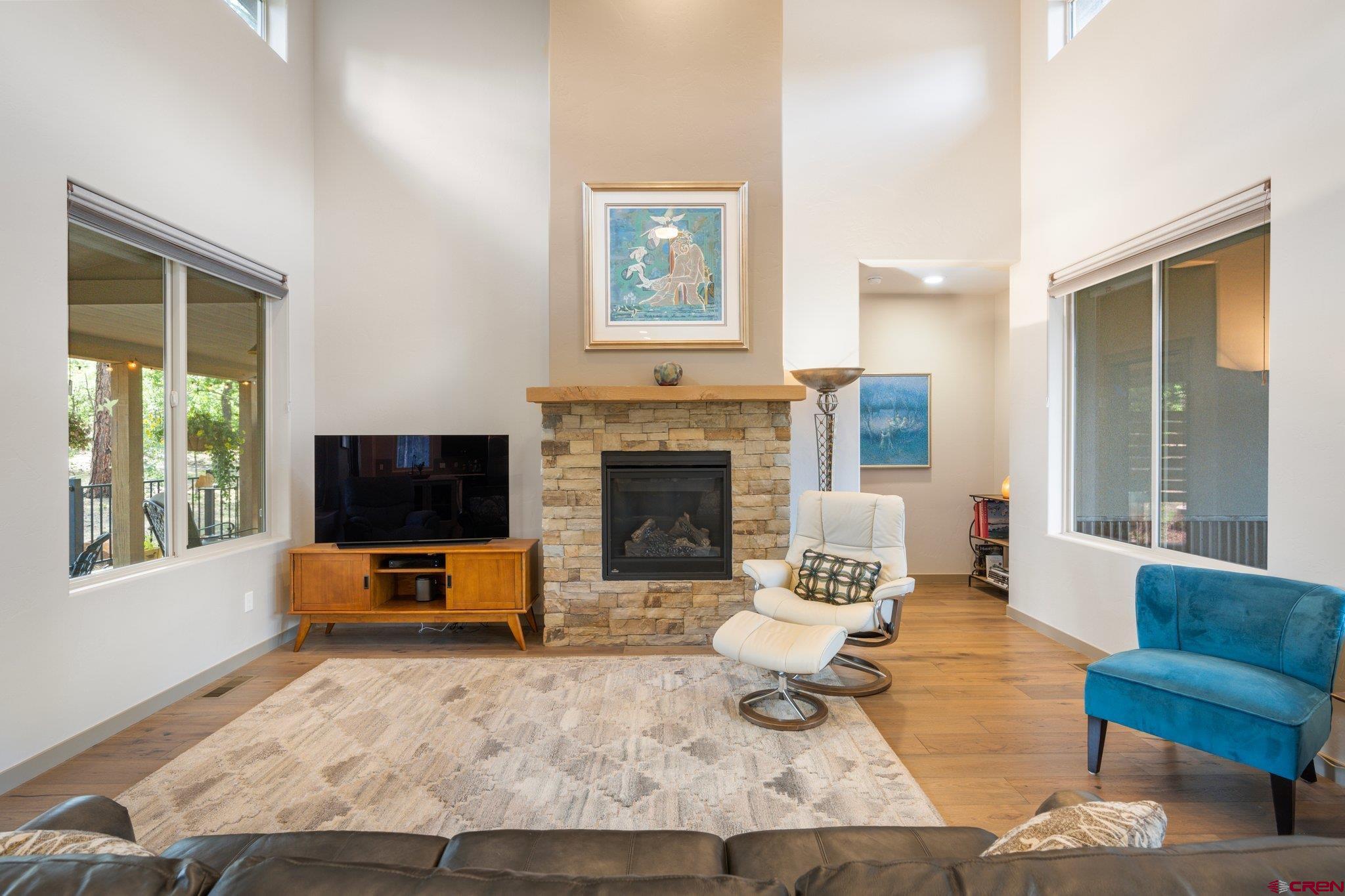 65 Needle Creek Trail Durango, CO 81301 - Photo 10 of 35 a living room with furniture and a flat screen tv