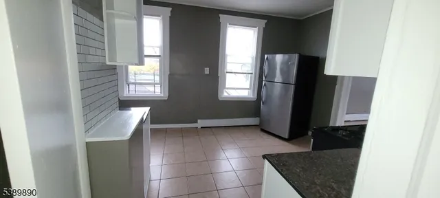 a view of kitchen with windows