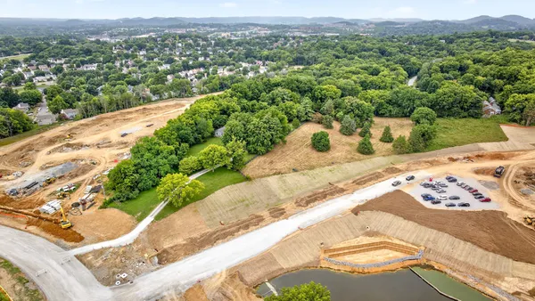 an aerial view of residential house with an outdoor space