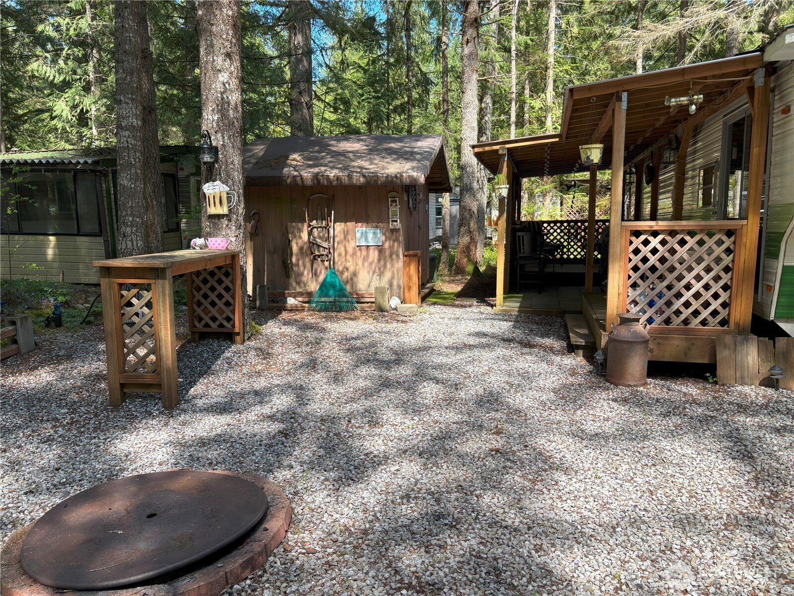 24-4 Drial Loop Maple Falls, WA 98266 - Photo 11 of 16 a view of a porch with furniture and a fire pit