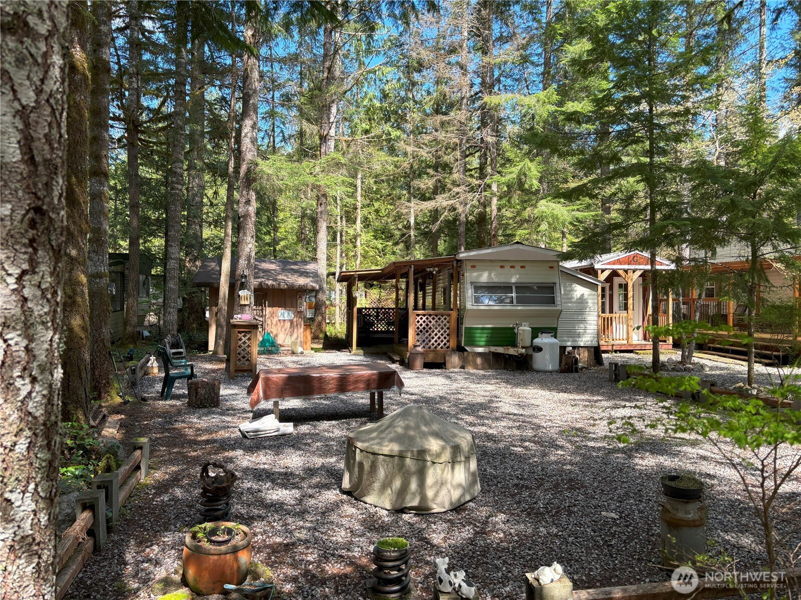 24-4 Drial Loop Maple Falls, WA 98266 - Photo 13 of 16 a front view of a house with sitting area