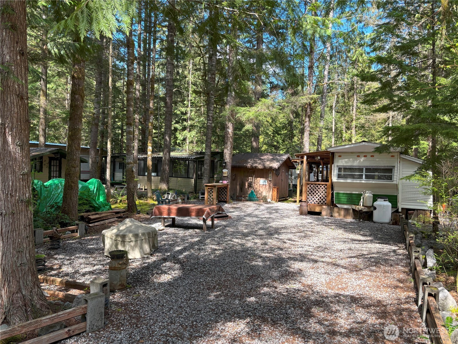 24-4 Drial Loop Maple Falls, WA 98266 - Photo 15 of 16 a view of a outdoor space with a patio and sitting area