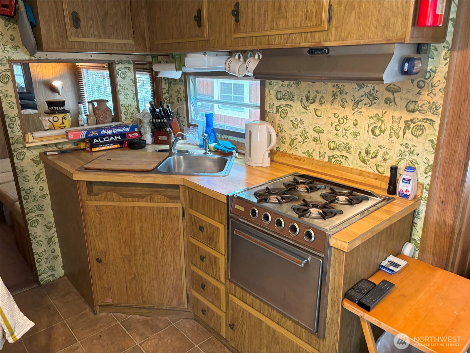 24-4 Drial Loop Maple Falls, WA 98266 - Photo 4 of 16 a kitchen with a stove and a shower