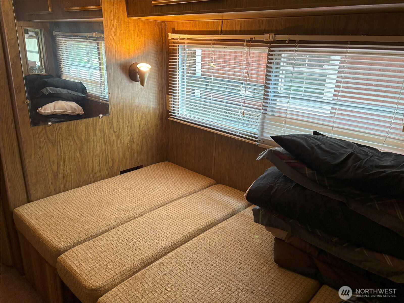 24-4 Drial Loop Maple Falls, WA 98266 - Photo 5 of 16 a bedroom with a bed and a window