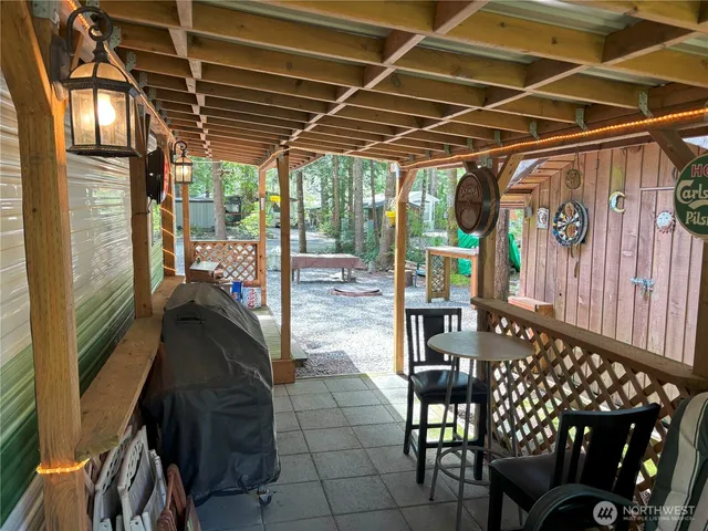 a view of a porch with furniture