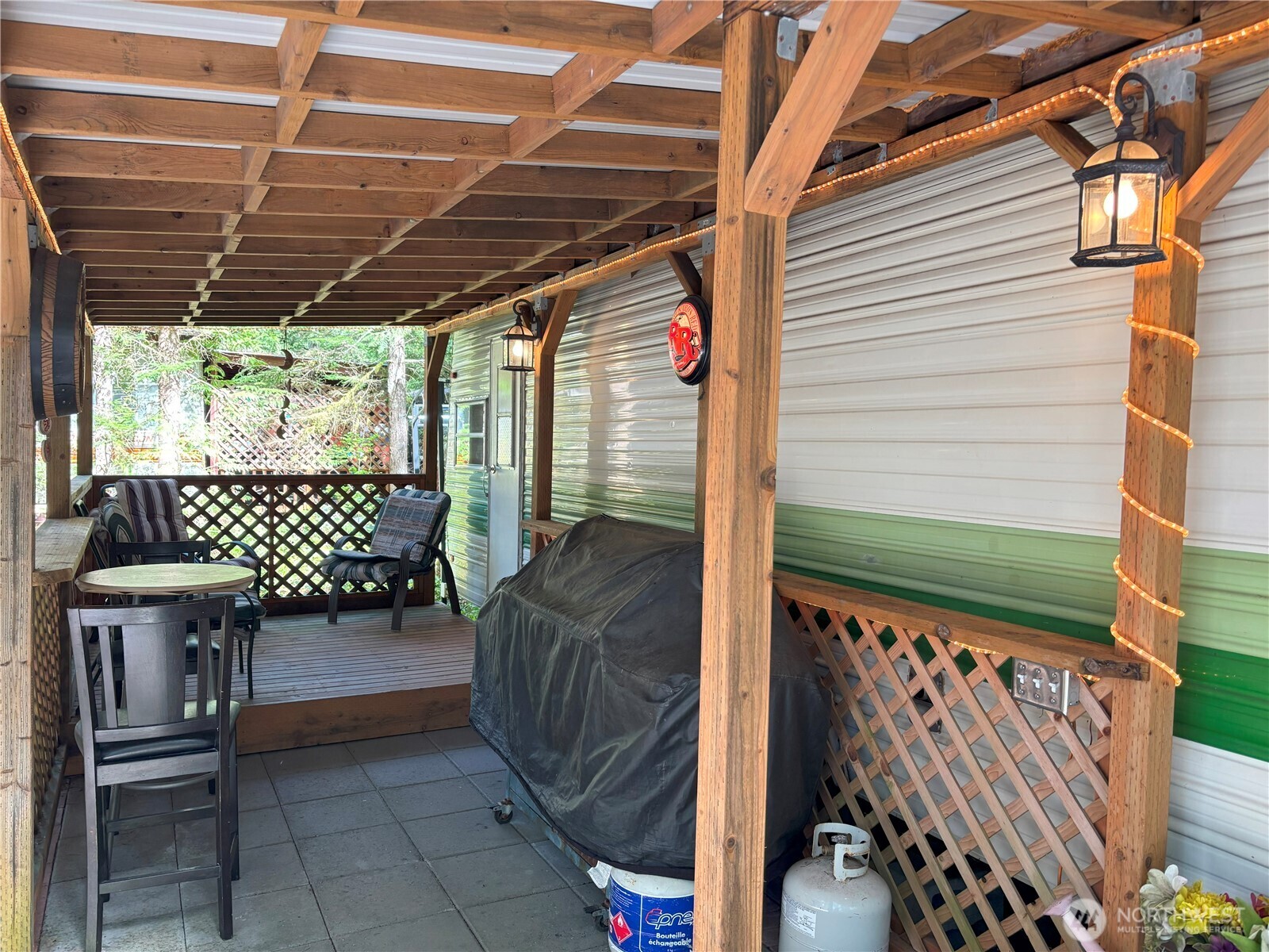 24-4 Drial Loop Maple Falls, WA 98266 - Photo 9 of 16 a view of a patio with table and chairs