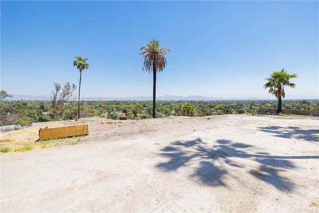 a view of a backyard of a house