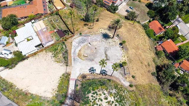 a view of swimming pool with a patio