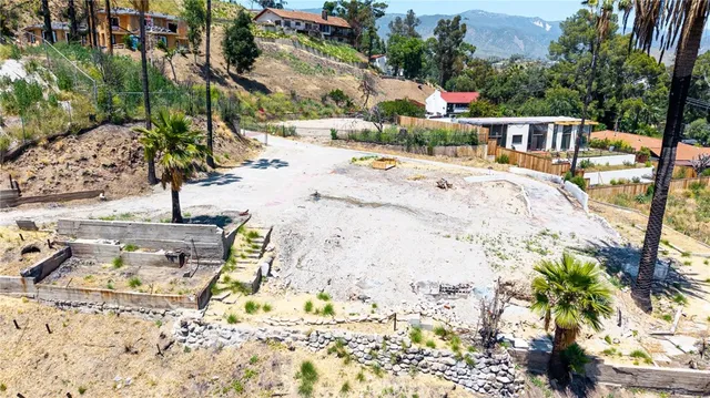 a view of yard with patio