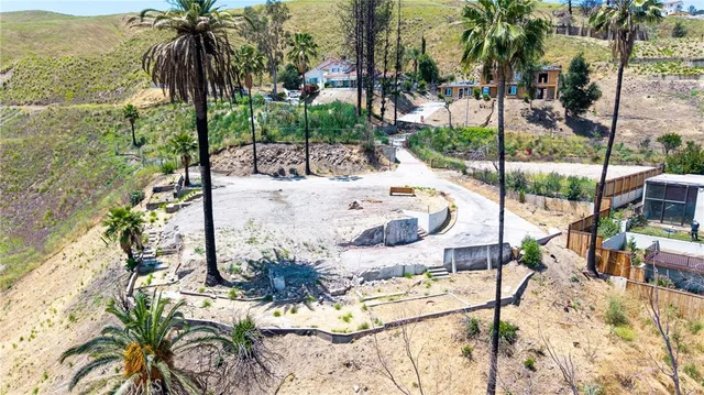 a view of swimming pool with a patio