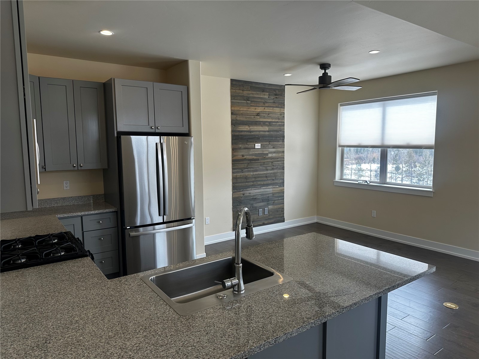 141 Wayback Drive, Unit B Keystone, CO 80435 - Photo 6 of 16 a kitchen with stainless steel appliances granite countertop a refrigerator a sink and a stove