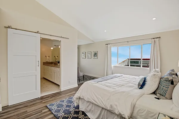 a bathroom with double sink and a mirror