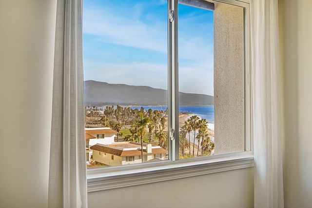 a view of a room that has a window