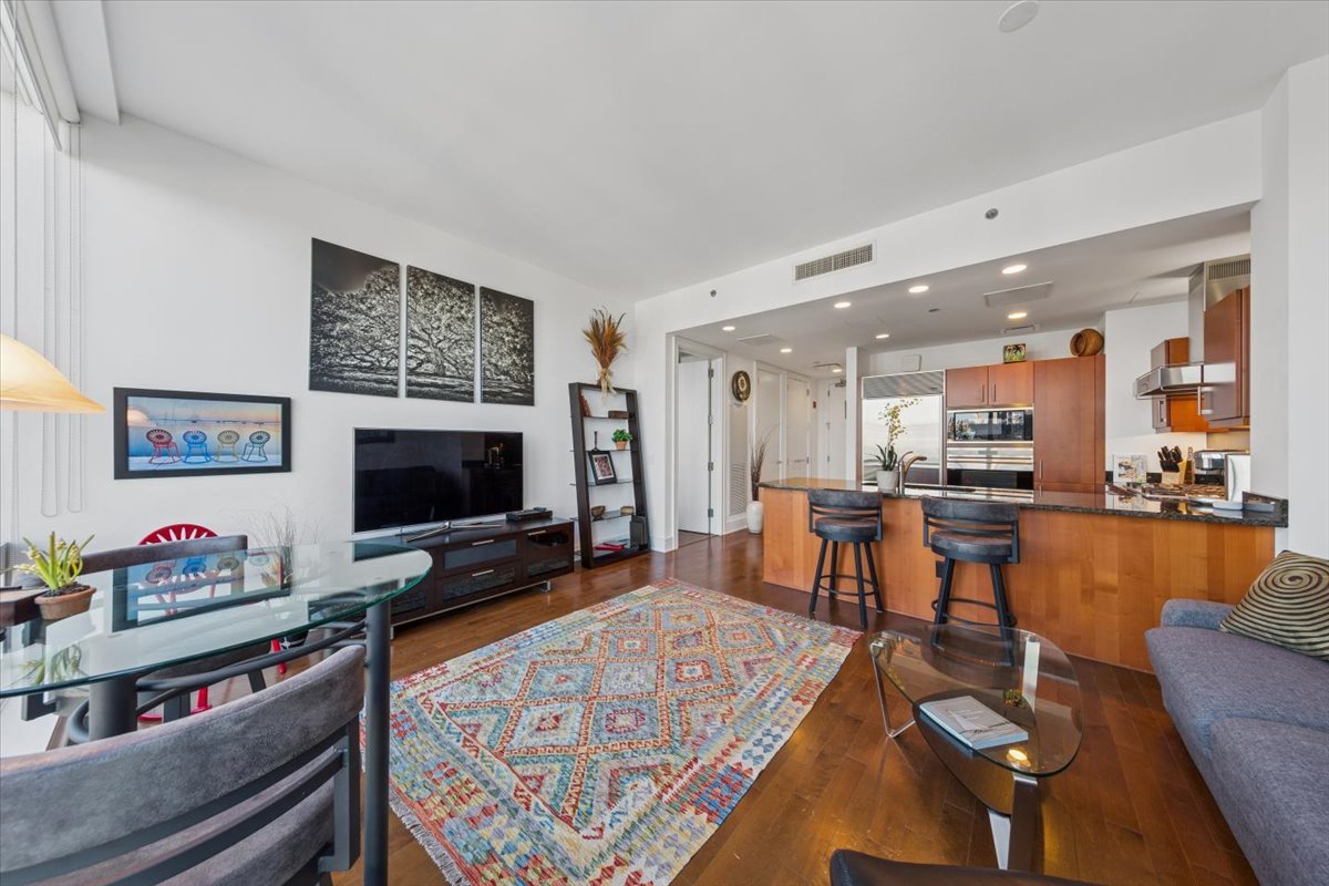 401 North Wabash Avenue, Unit 37I Chicago, IL 60611 - Photo 11 of 40 a living room with furniture and a flat screen tv