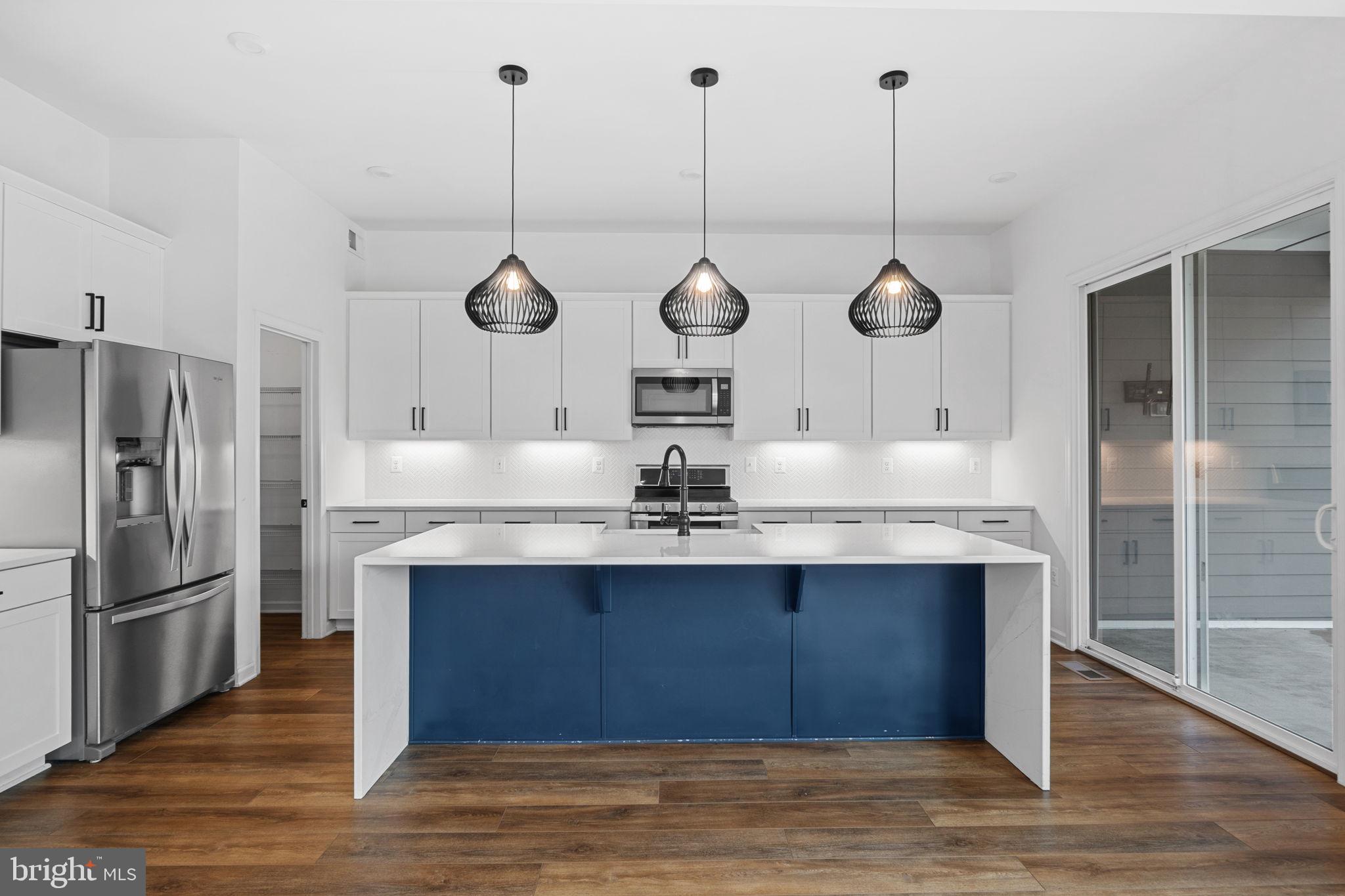 18080 Moss Garden Road Dumfries, VA 22026 - Photo 14 of 76 a view of a kitchen with a sink and dishwasher