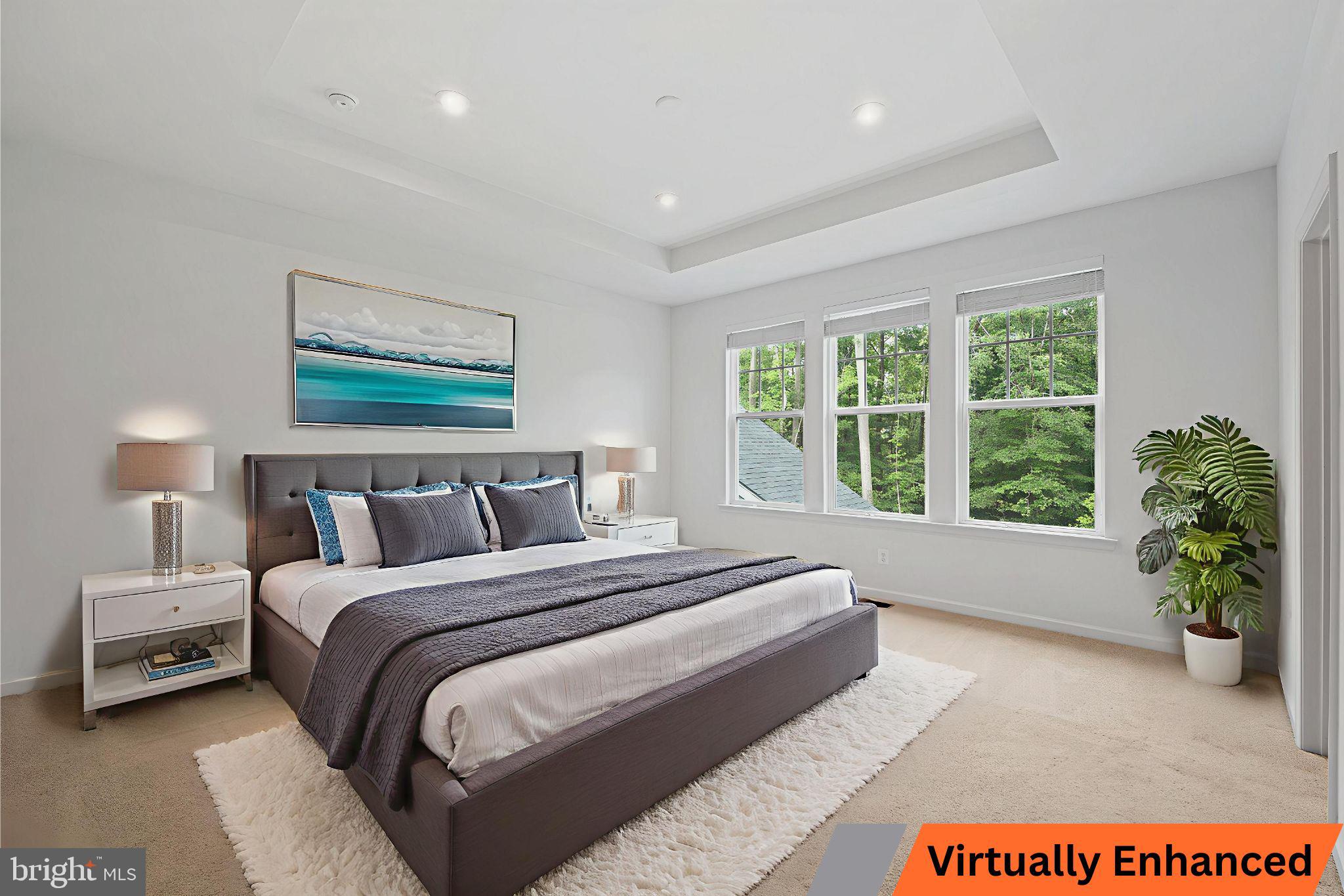 18080 Moss Garden Road Dumfries, VA 22026 - Photo 23 of 76 a spacious bedroom with a large bed and a large window