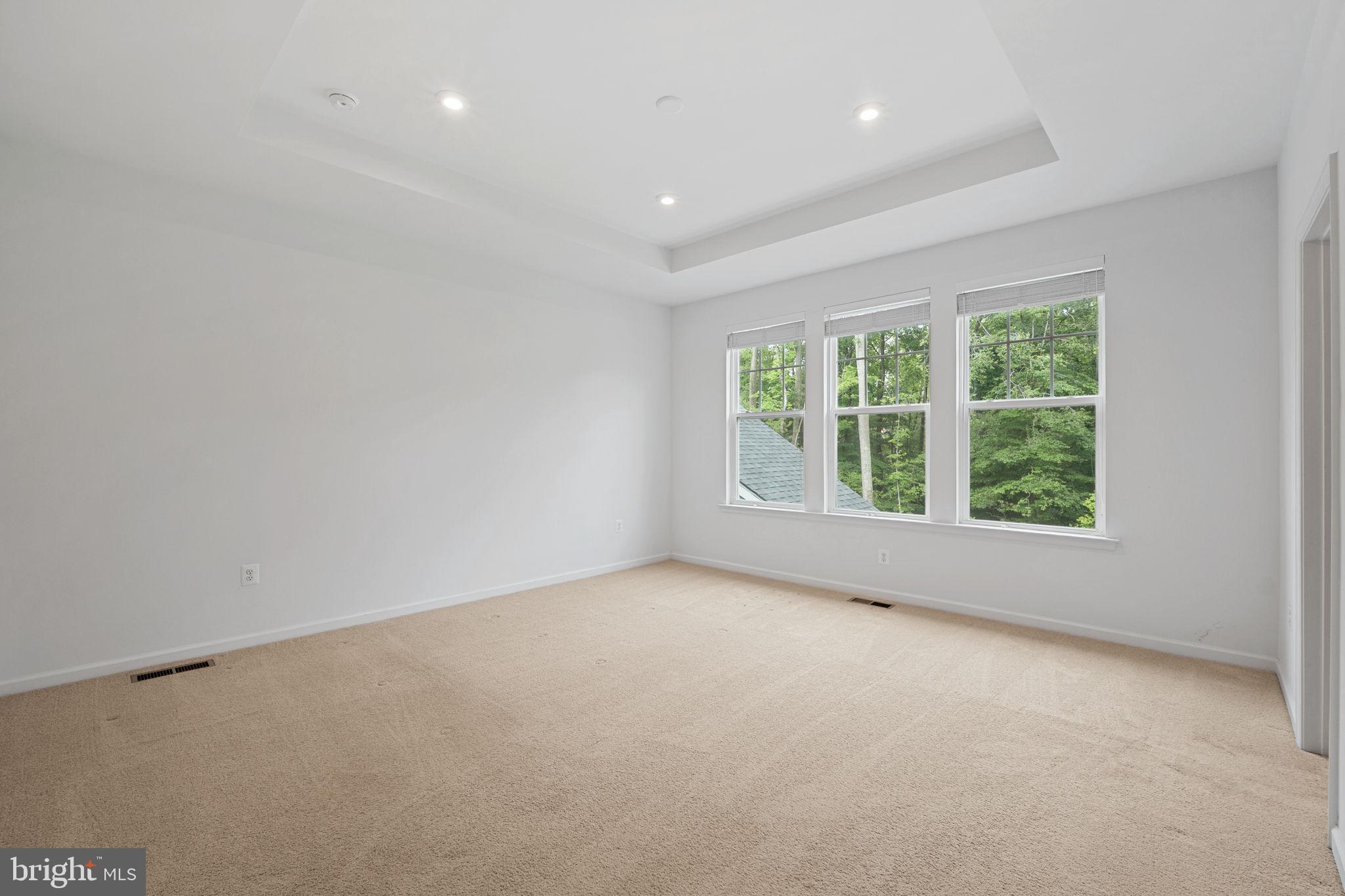 18080 Moss Garden Road Dumfries, VA 22026 - Photo 25 of 76 an empty room with windows